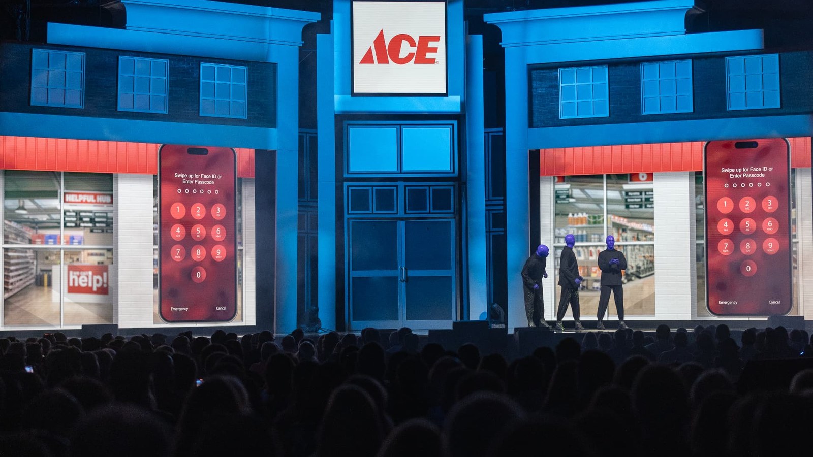 A blue storefront-inspired Ace keynote stage with presenters and an audience.